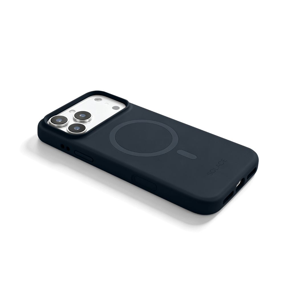 A dark navy blue MagSafe-compatible phone case shown from an angled perspective on a clean white background.