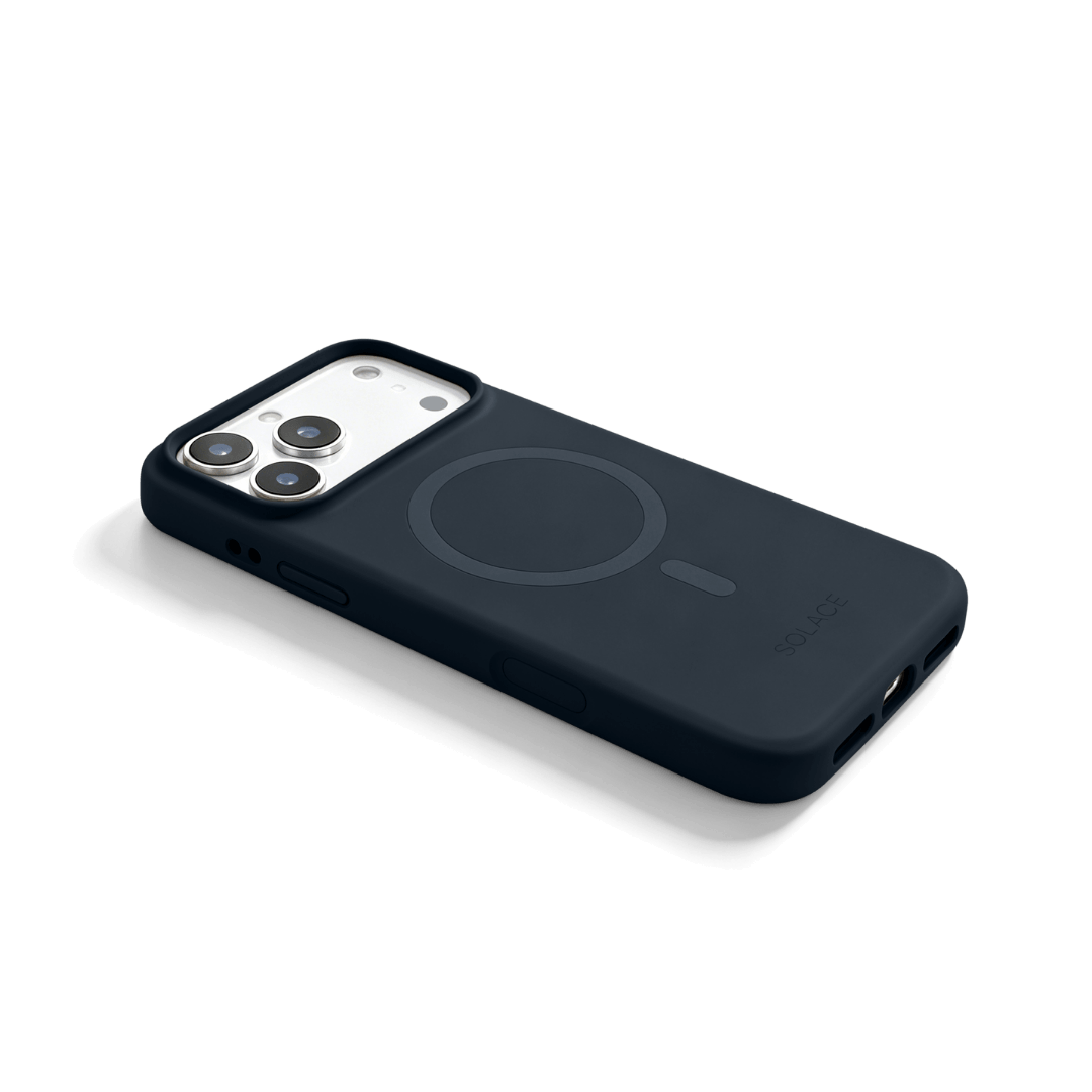 A dark navy blue MagSafe-compatible phone case shown from an angled perspective on a clean white background.