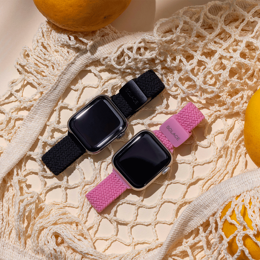 2 apple watch bands laying on a table