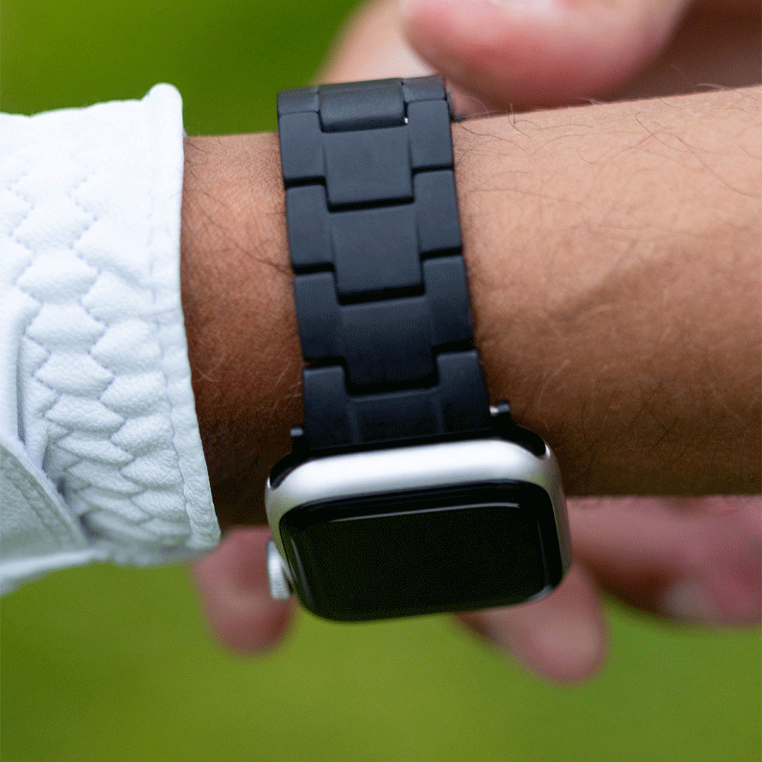 a black apple watch band with adjustable links
