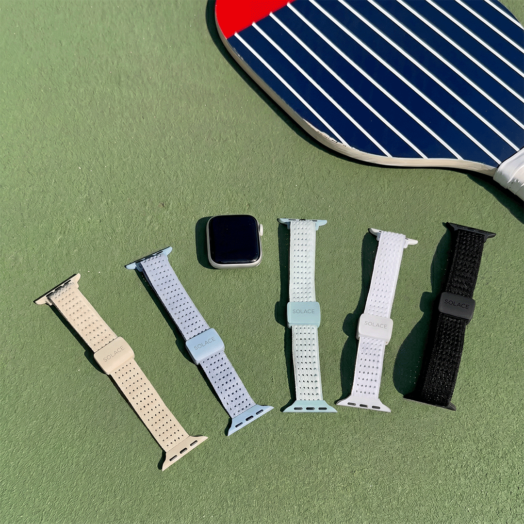 sport apple watch bands next to a pickleball paddle